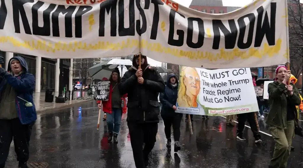 Protesters march in Minneapolis against ICE after fatal shooting - AP Photo/Jose Luis Magana