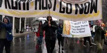 Protesters march in Minneapolis against ICE after fatal shooting - AP Photo/Jose Luis Magana