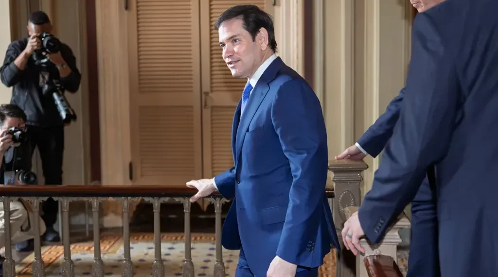 U.S. and Greenland flags highlighting Arctic strategic discussions - AP Photo/J. Scott Applewhite