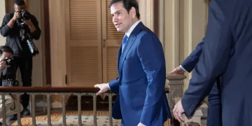 U.S. and Greenland flags highlighting Arctic strategic discussions - AP Photo/J. Scott Applewhite