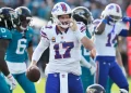 Josh Allen celebrates historic Bills road playoff win - AP Photo/Chris O'Meara