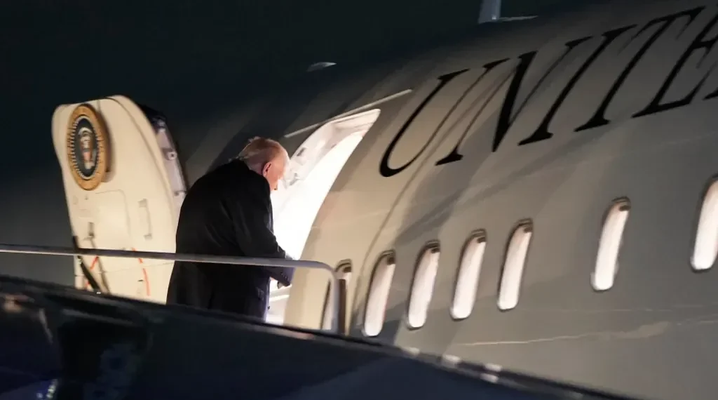 Trump speaking aboard Air Force One on Venezuela oil policy - AP Photo/Julia Demaree Nikhinson