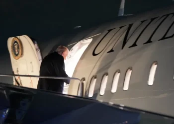 Trump speaking aboard Air Force One on Venezuela oil policy - AP Photo/Julia Demaree Nikhinson