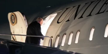 Trump speaking aboard Air Force One on Venezuela oil policy - AP Photo/Julia Demaree Nikhinson