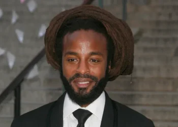 John Forté performing on stage during a live concert - Photo by Andy Kropa/Invasion/AP, File