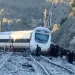 Overturned high-speed train carriages after collision in Spain - Guardia Civil via AP