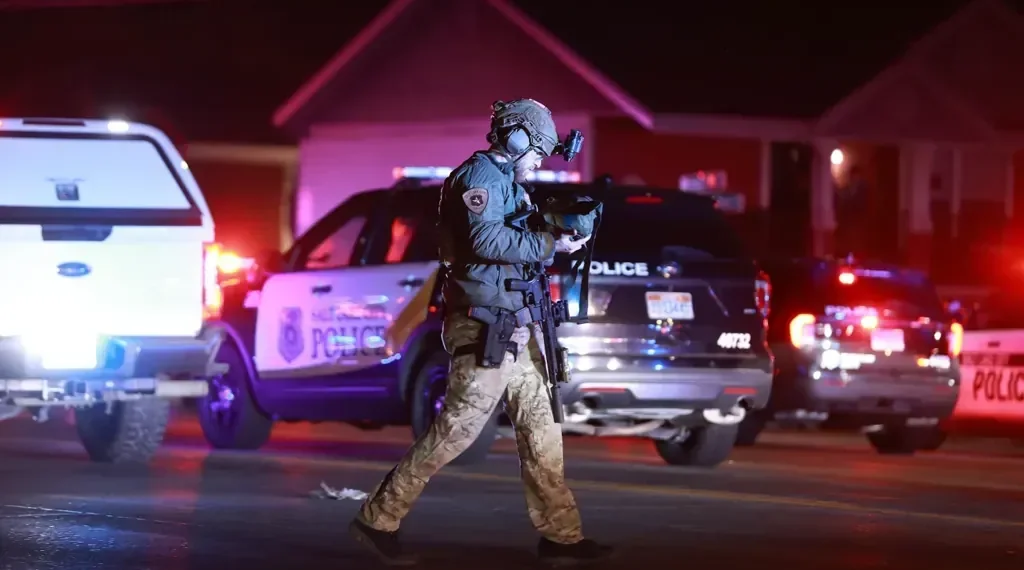 Police respond outside Salt Lake City Mormon church after shooting - Rio Giancarlo/The Deseret News via AP