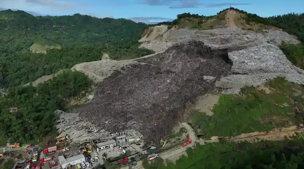 Rescuers search debris after Philippine landfill collapse in Cebu City - AP Photo/Jaqueline Hernandez