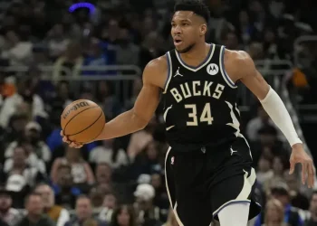Giannis Antetokounmpo reacts during a Milwaukee Bucks game - GettyImages/NBCSports