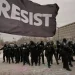 Protesters gather near federal building during Minneapolis immigration protests - AP Photo/John Locher