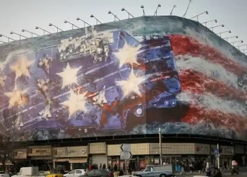 Iranian mural warning U.S. against military strike in Tehran - AP Photo/Vahid Salemi