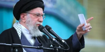 Iranian protesters face security forces during unrest in Tehran - Office of the Iranian Supreme Leader via AP