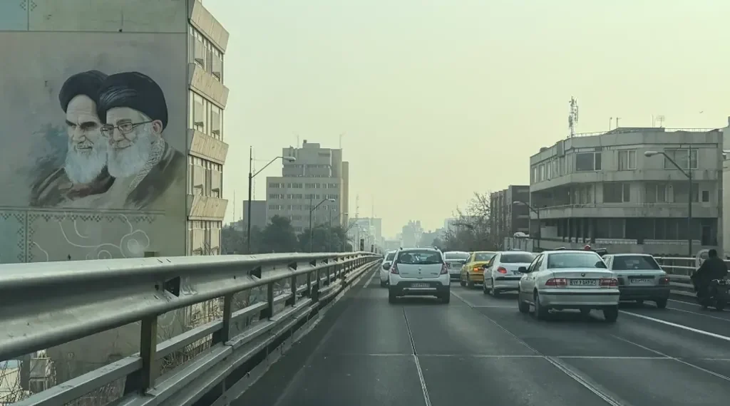 Iranian protesters face security forces during nationwide unrest - AP Photo/Vahid Salemi