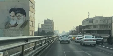 Iranian protesters face security forces during nationwide unrest - AP Photo/Vahid Salemi