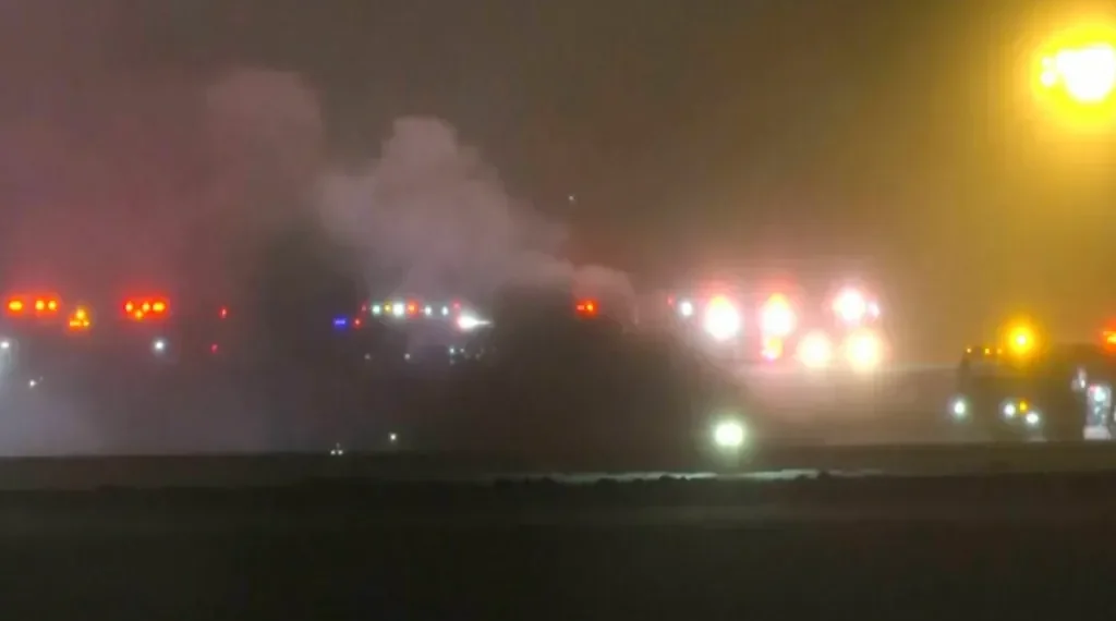 Wreckage of business jet after fatal crash at Bangor airport - WABI via AP