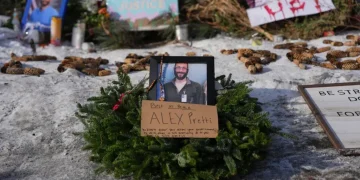 Minneapolis vigil following fatal immigration enforcement shooting - AP Photo/Adam Gray
