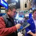 US stocks trade higher as gold prices hit a record - AP Photo/Richard Drew
