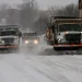 Snow-covered airport runway during U.S. winter storm disruptions - Mike Simons/Tulsa World via AP