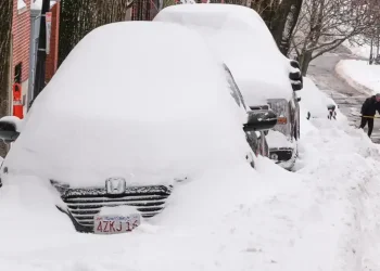 Snow-covered US city during deadly winter storm and power outages - AP Photo/Charles Krupa