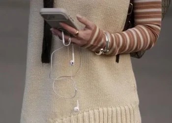 NBA players and celebrities wearing wired headphones in public - Moritz Scholz/Getty Images