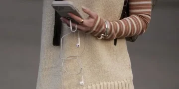 NBA players and celebrities wearing wired headphones in public - Moritz Scholz/Getty Images