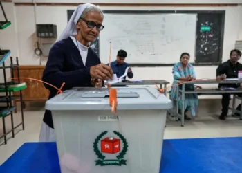 Bangladeshi voters queue outside polling station during historic 2026 election - AP Photo/Anupam Nath