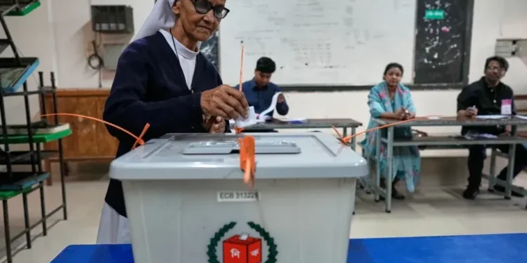 Bangladeshi voters queue outside polling station during historic 2026 election - AP Photo/Anupam Nath