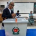 Bangladeshi voters queue outside polling station during historic 2026 election - AP Photo/Anupam Nath