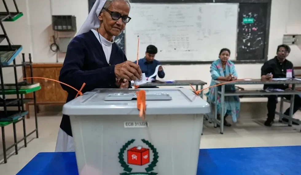 Bangladeshi voters queue outside polling station during historic 2026 election - AP Photo/Anupam Nath