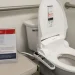 Bidet attachment on toilet illustrating water cleansing after bathroom use - Robin Scholz/The News-Gazette via AP, File