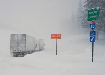 Rescuers search snow-covered Sierra Nevada after avalanche - AP Photos/Brooke Hess-Homeier