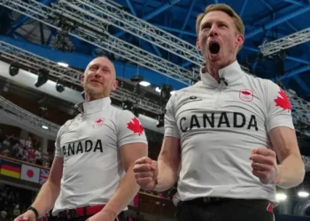 Canada men’s curling team celebrates Olympic gold in Cortina - AP Photo/Misper Apawu