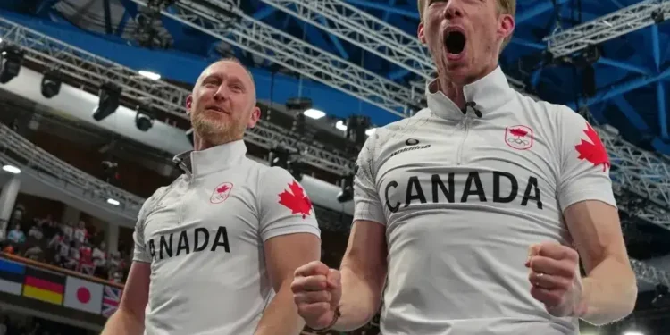 Canada men’s curling team celebrates Olympic gold in Cortina - AP Photo/Misper Apawu