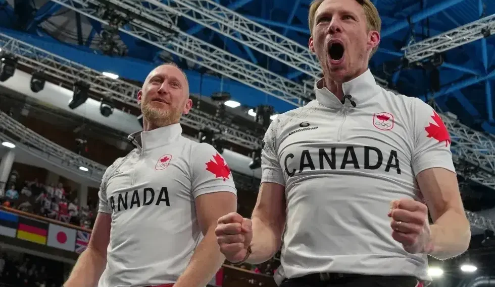 Canada men’s curling team celebrates Olympic gold in Cortina - AP Photo/Misper Apawu