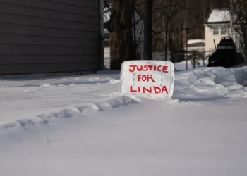 Police vehicles outside Wilmington home after reported domestic dispute investigation - AP Photo/Mingson Lau