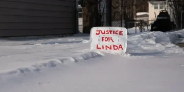 Police vehicles outside Wilmington home after reported domestic dispute investigation - AP Photo/Mingson Lau