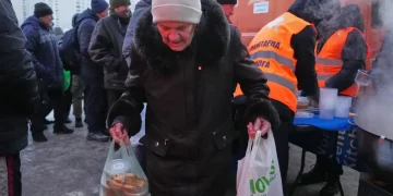 Damaged electrical substation after missile strike during armed conflict - AP Photo/Sergey Grits