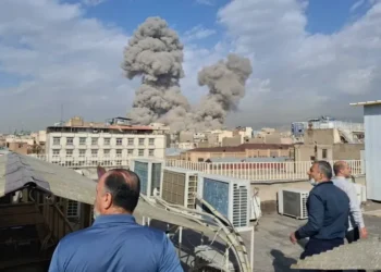 Smoke rises over Tehran after Israeli strike - AP Photo