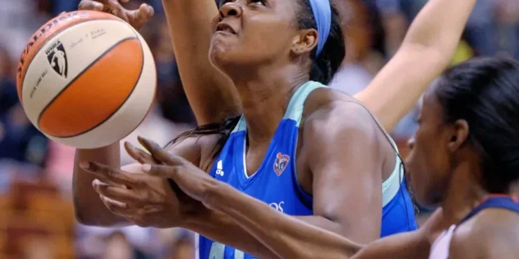 Kara Braxton during WNBA game action - Sean D. Elliot/The Day via AP