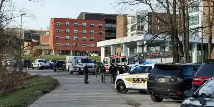 Police vehicles outside Kentucky State University dormitory - Hannah Brown/The State Journal via AP