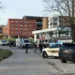 Police vehicles outside Kentucky State University dormitory - Hannah Brown/The State Journal via AP