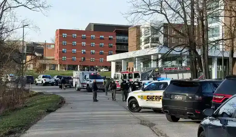 Police vehicles outside Kentucky State University dormitory - Hannah Brown/The State Journal via AP