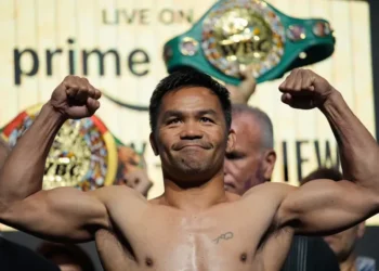 Floyd Mayweather and Manny Pacquiao face off in Las Vegas - AP Photo/John Locher, File