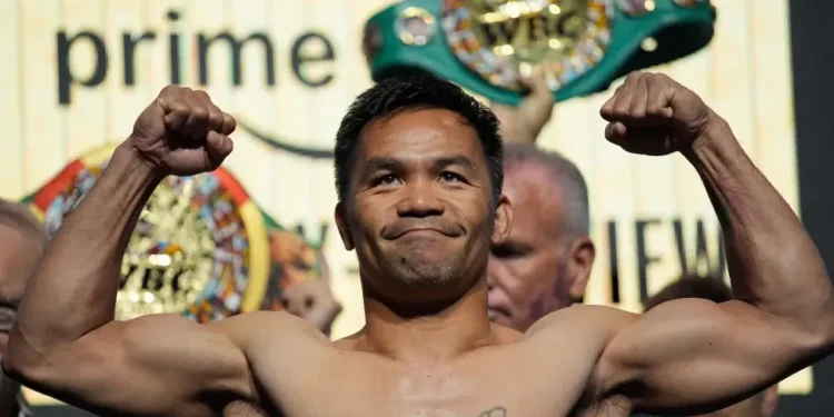 Floyd Mayweather and Manny Pacquiao face off in Las Vegas - AP Photo/John Locher, File