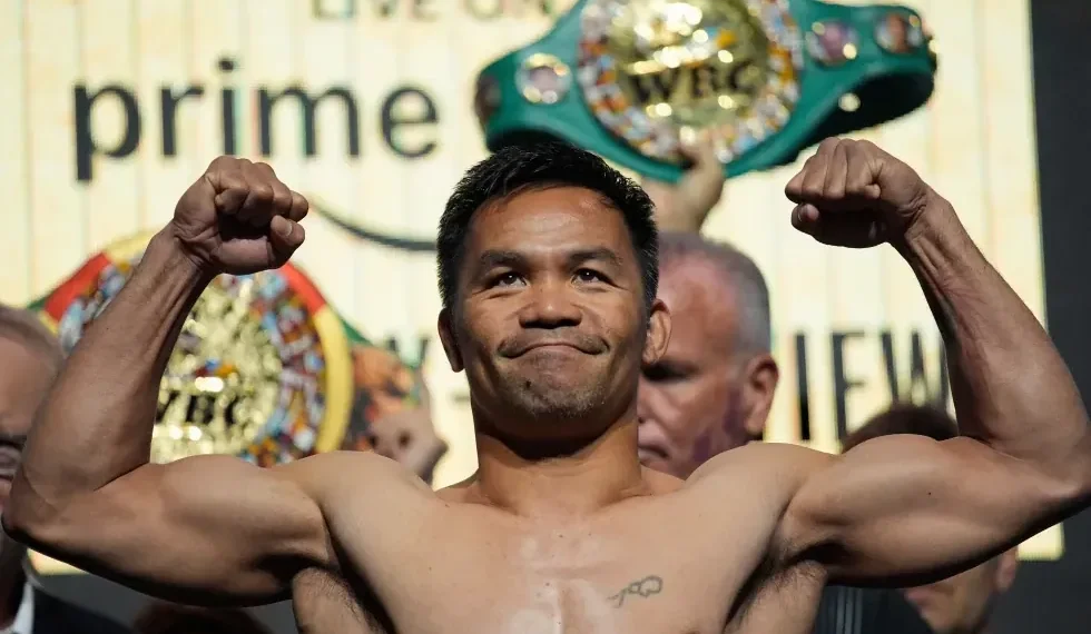 Floyd Mayweather and Manny Pacquiao face off in Las Vegas - AP Photo/John Locher, File