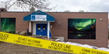 OpenAI logo and RCMP investigation in Canada - Christinne Muschi/The Canadian Press via AP