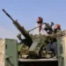 Pakistani and Afghan border forces after cross-border strikes - AP Photo/Saifullah Zahir
