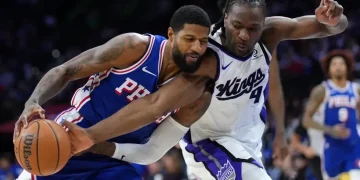 Paul George during a Philadelphia 76ers game before NBA suspension - AP Photo/Matt Slocum