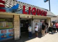 Powerball lottery ticket and jackpot display board - Damian Dovarganes /AP Photo, File