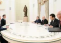 Vladimir Putin at Kremlin meeting on Ukraine talks - Kristina Kormilitsyna/Reuters/CNN